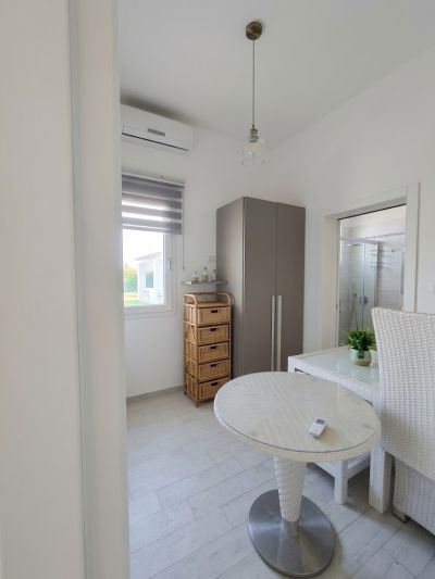 Luminosa e Moderna Villetta con Vista Mare e Giardino Privato
